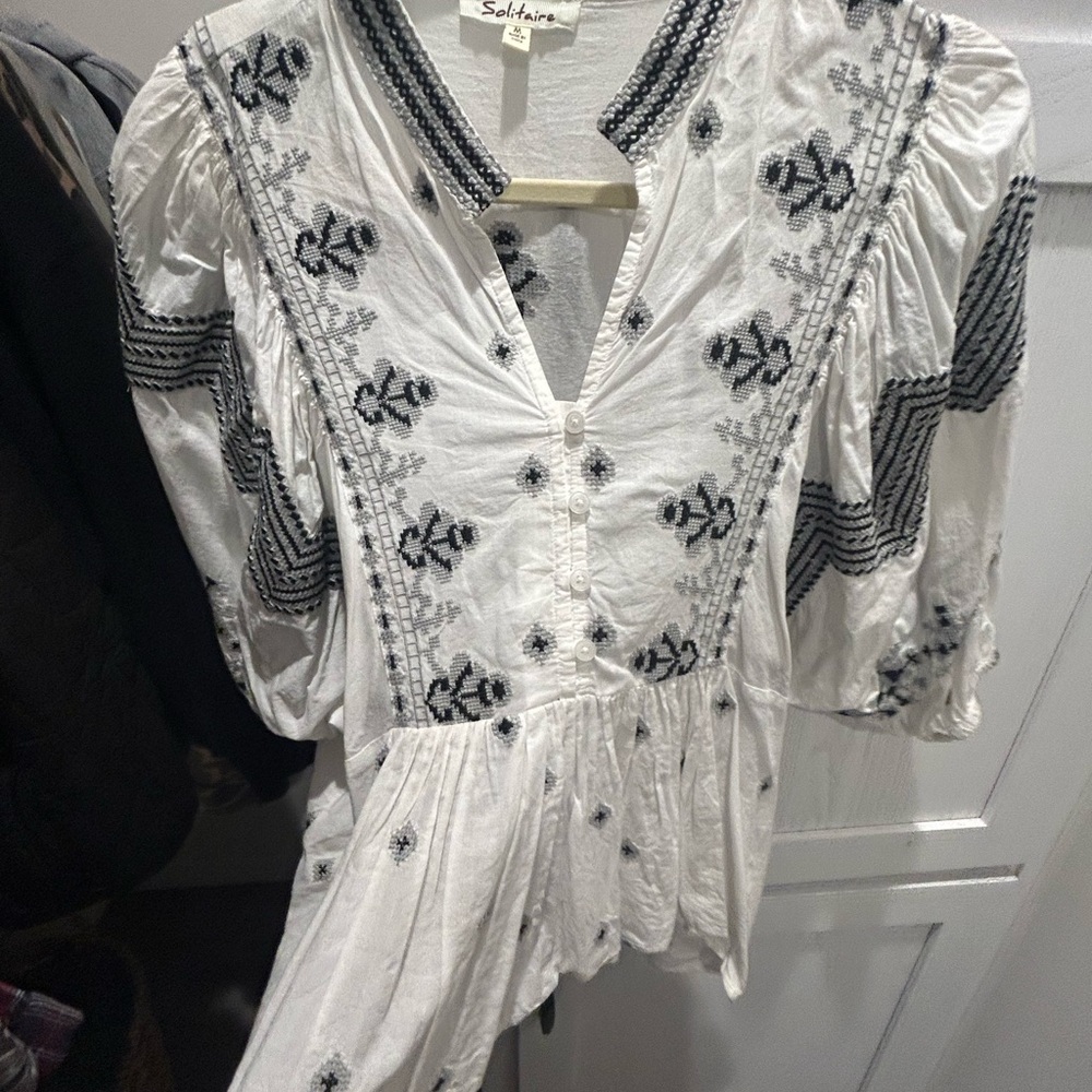 Solitaire White Peplum Blouse with Black Embroidery